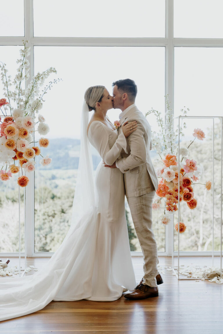 Bride and Groom kissing as they become husband and wife